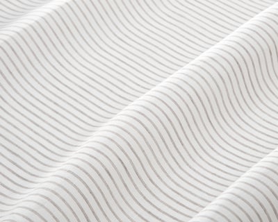 linen fabric with thin grey stripes close up