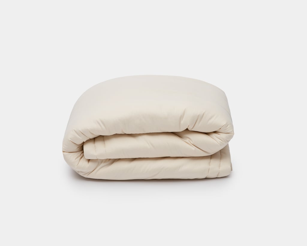 couples wool duvet folded on a white background. Big wool duvet
