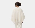 woman wearing home of wool poncho