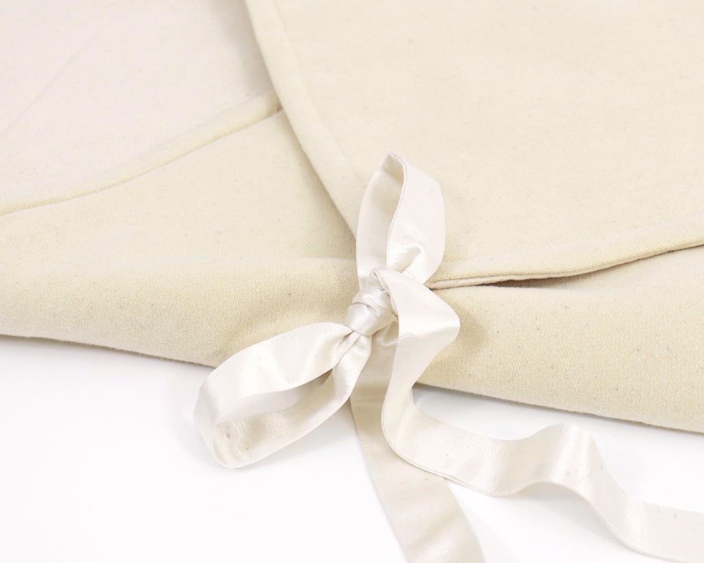 close up of bow wool saddle baby blanket