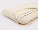 Wool baby lounger with optional pillowcase and topper