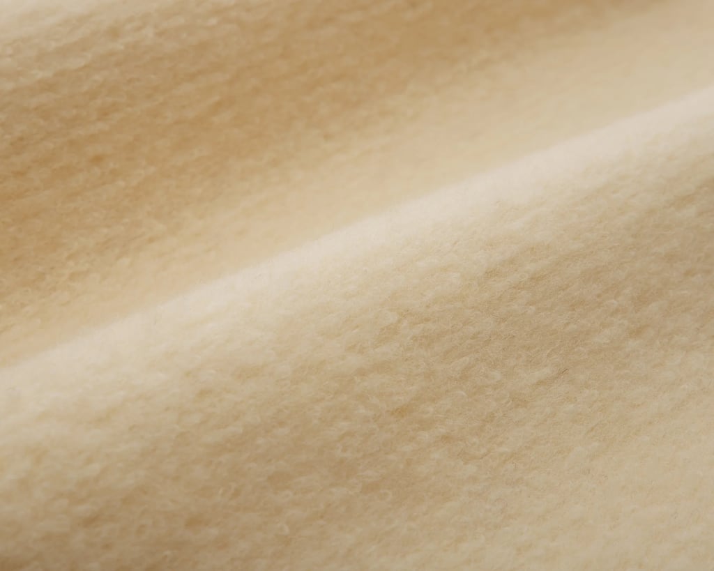 close up of karakul wool fabric by home of wool