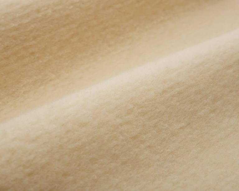 close up of karakul wool fabric by home of wool