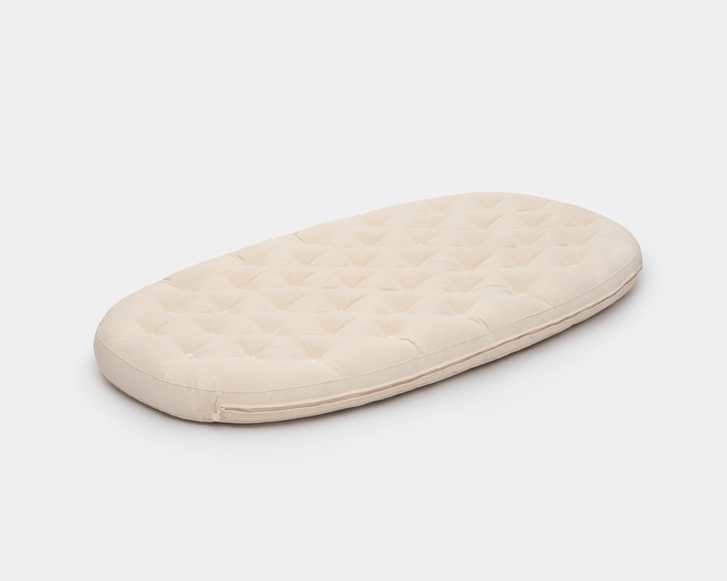 Matelas en laine pour lit bébé Stokke