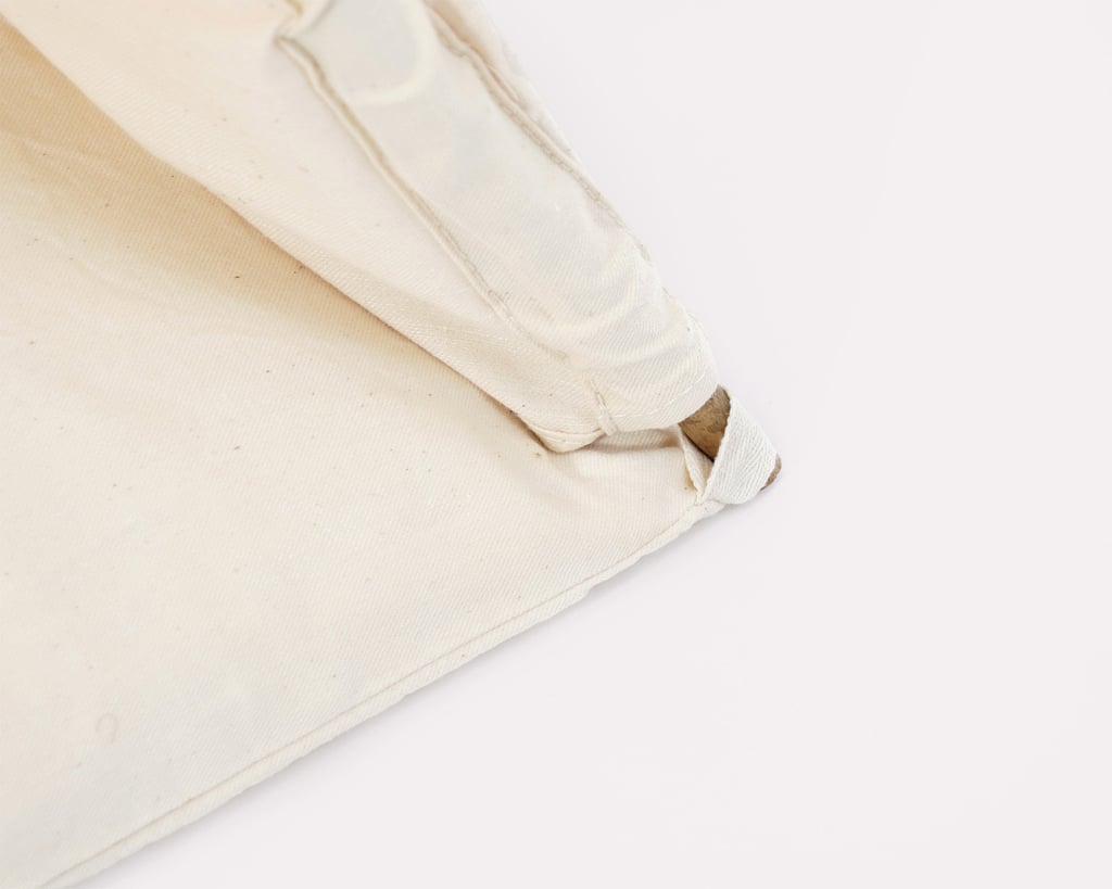 close up of the kids teepee showing its corner and how the cushion attaches to rod and it is held in place