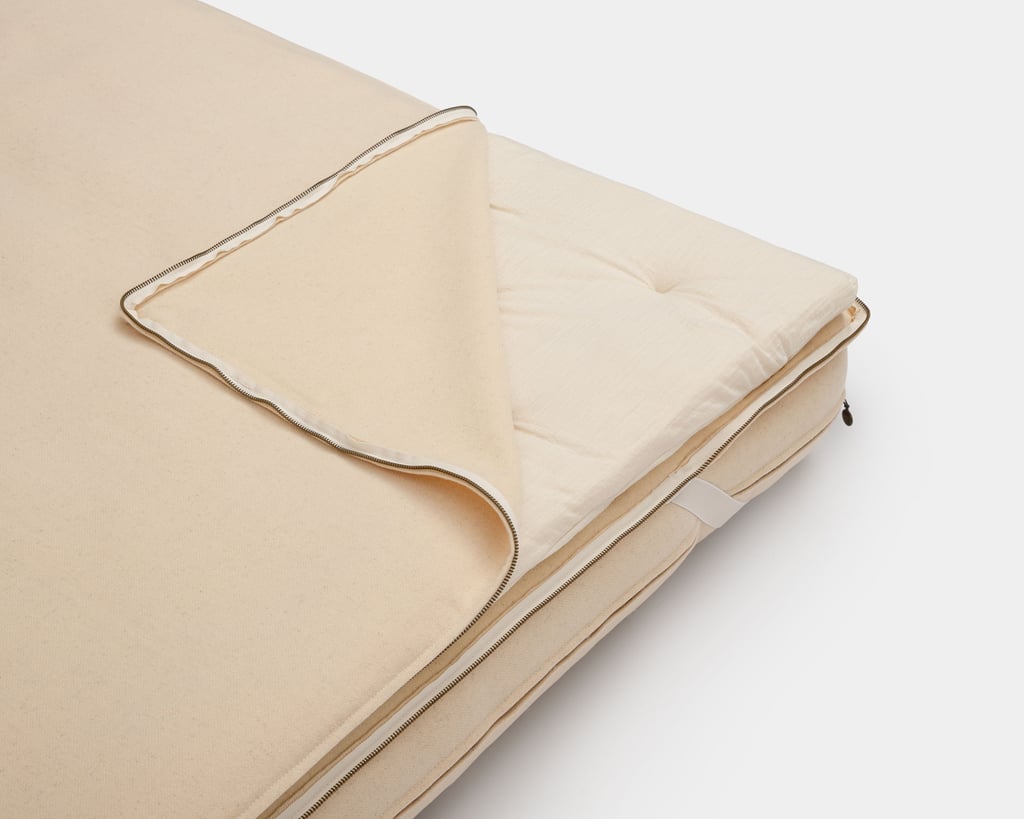 Wool topper with wool batting filling detail inside, unzipped