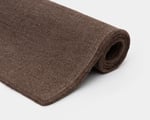 rolled up wool flat woven rug