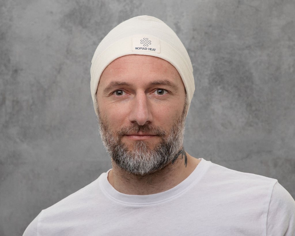 man met muts in 100% merinoswol