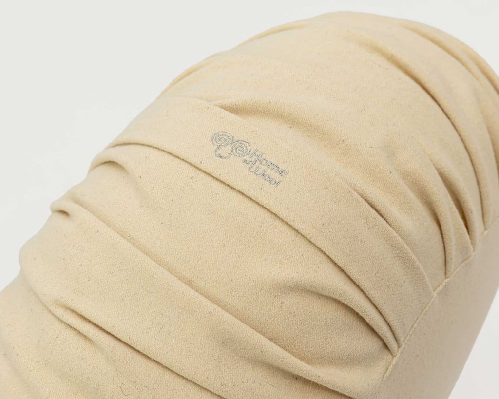 logo "home of wool" su pouf ottomano